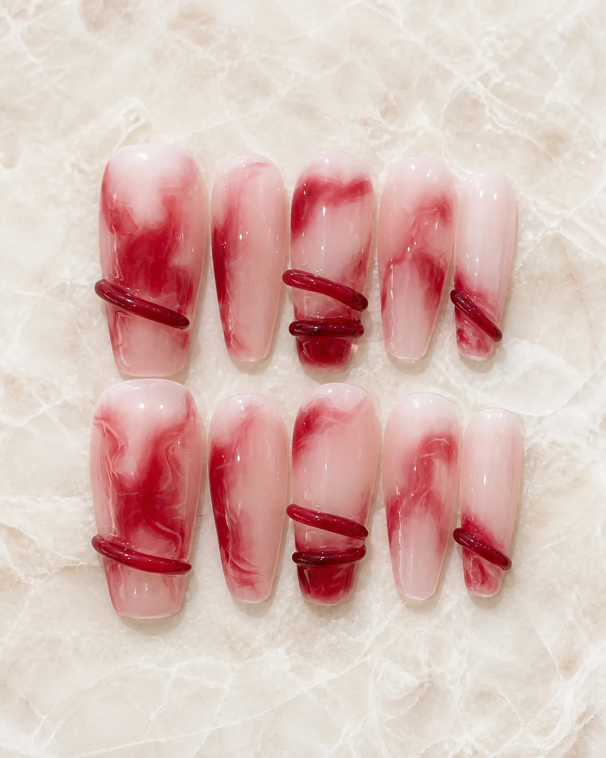 Red Sandalwood Swirl Press-On Nails product photograph