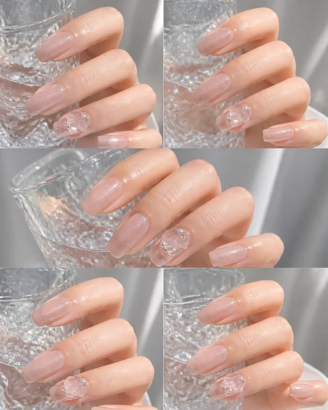 Pink Cat-Eye French Press-On Nails worn on hand