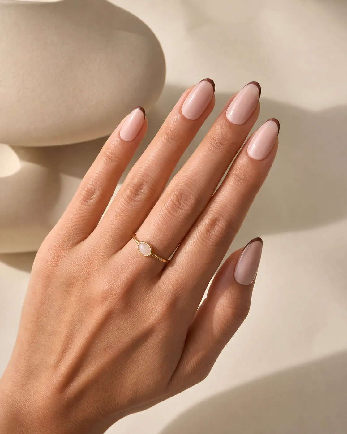 Press-on manicure worn on hand